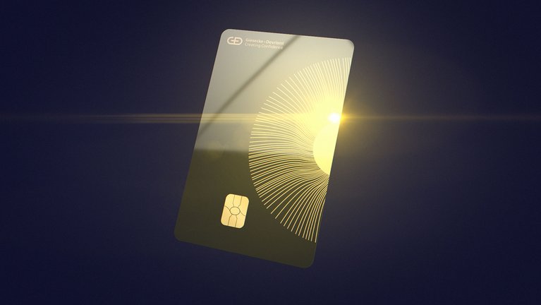A payment card floating over a black background