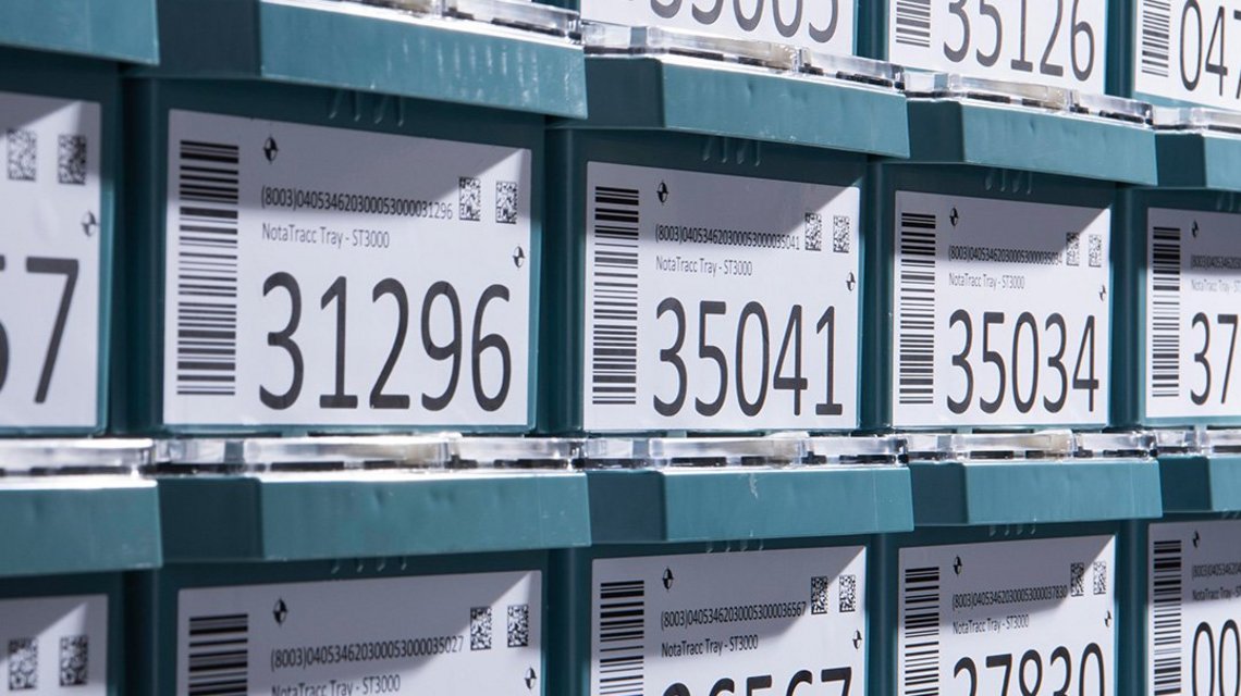 NotaTray®, green plastic boxes, for automation through standardization in cash centers