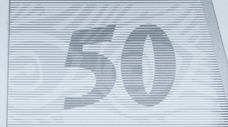 Close-up of a banknote with intaglio printing and a depicted 50