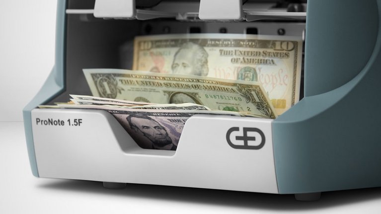 Close-up of the output tray of the ProNote® 1.5 tabletop banknote processing system