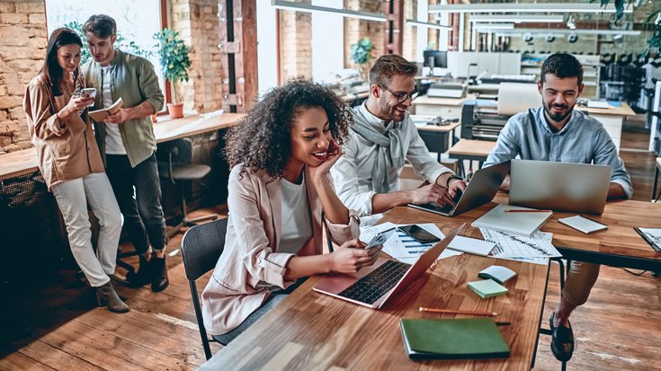 People working together using eSIM Device Enablement Service