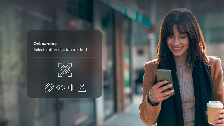 Woman looks at her smartphone and selects an authentication method