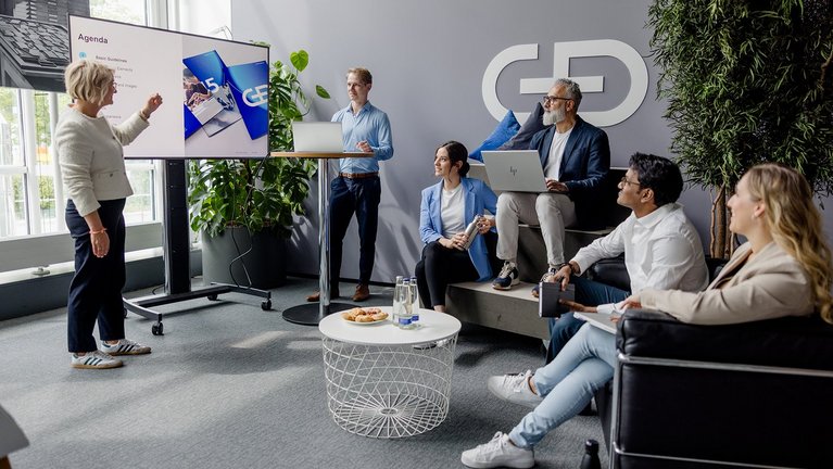 Team during a presentation in a modern office