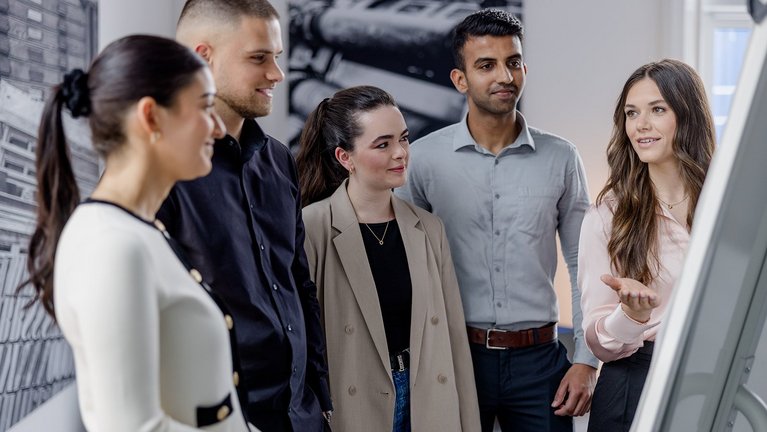 Colleagues discussing in office