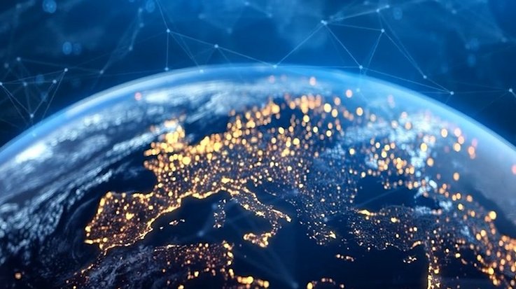 View of Earth from space showing illuminated cities in Europe with digital network connections.