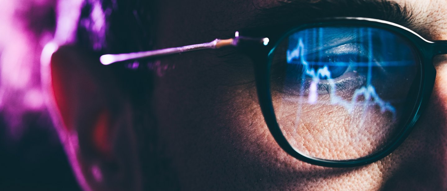 Man with glasses in digital area