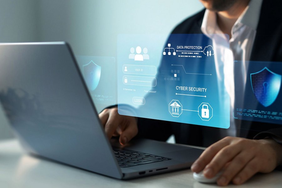 Man using a laptop to securely log into his account, highlighting safe online access and security.