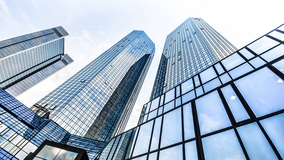 Tall glass skyscrapers viewed from below