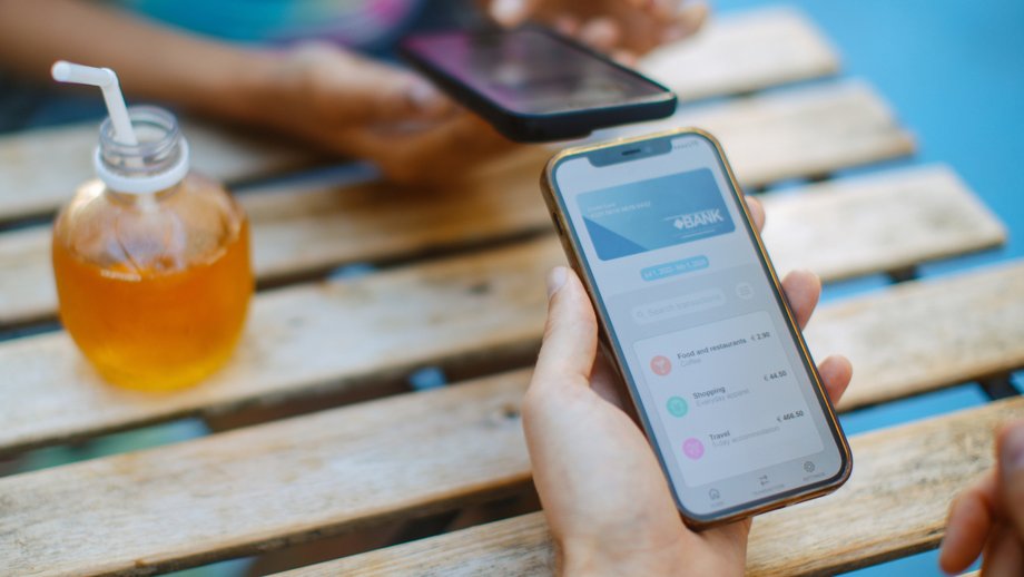 Person checking account balance on mobile bank app