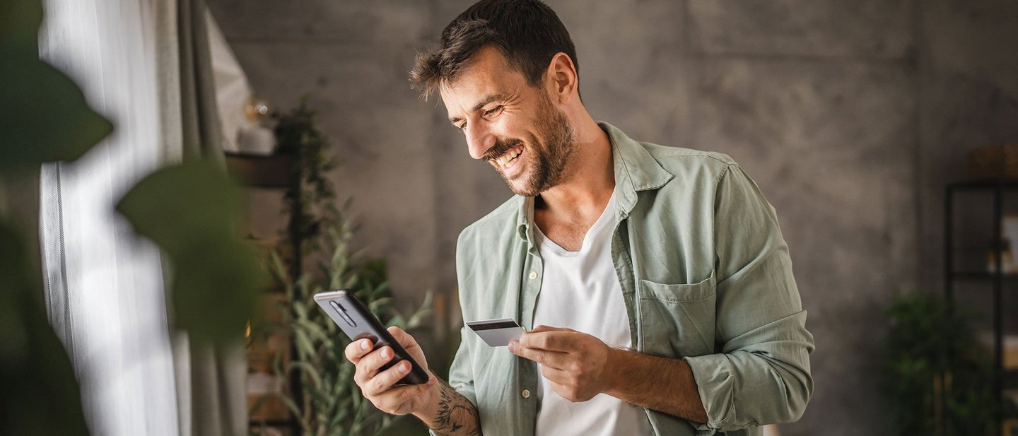 A man checks his credit card date.