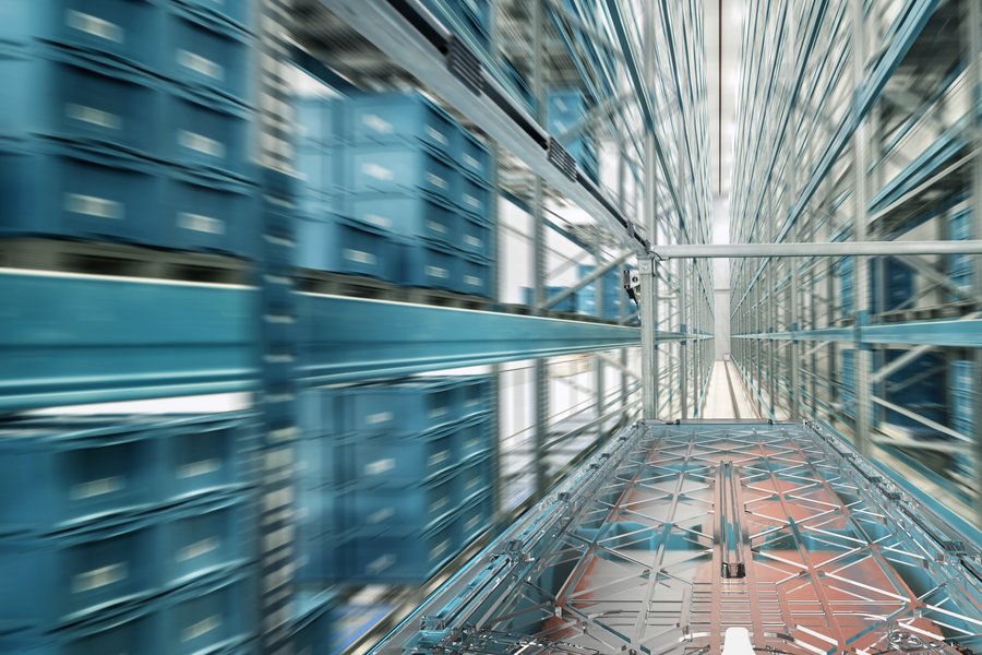 Blurred path between rows of notatray boxes