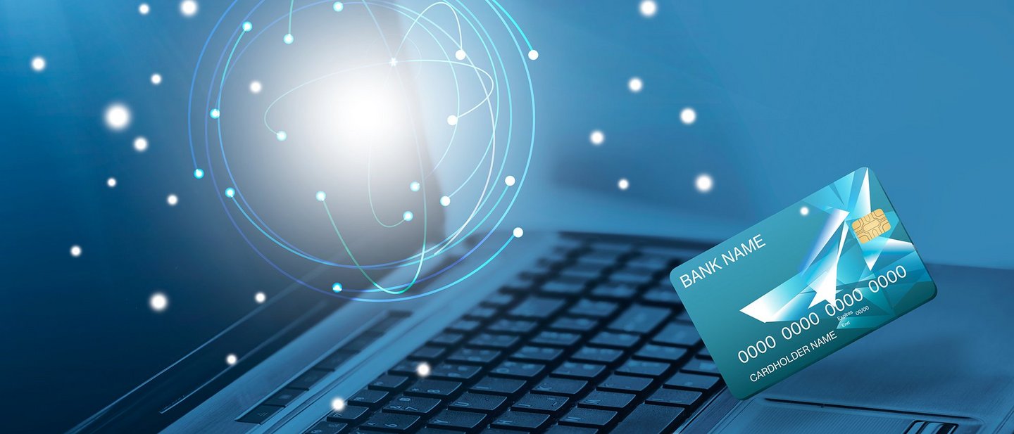 Technology concept bank card and a laptop