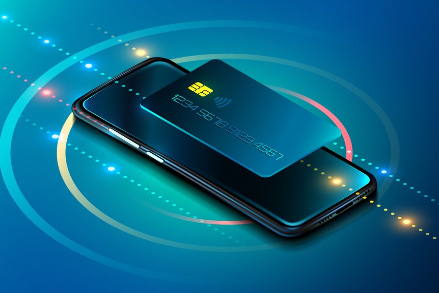 A credit card rests on a smartphone, surrounded by glowing circles and dots symbolizing contactless payment