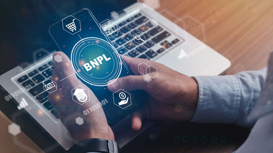 Businessman using BNPL Technology with his smartphone