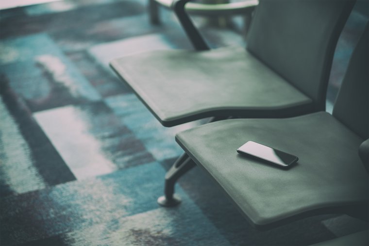 Passenger lost a mobile phone on the airport chair