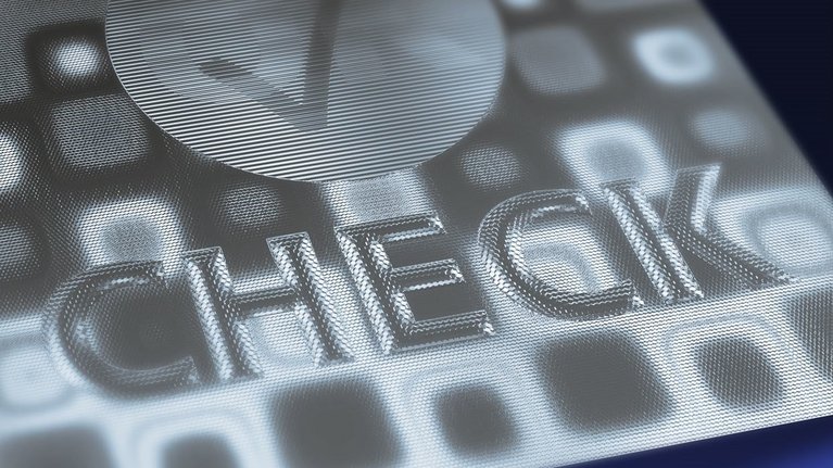 A hologram with a tick and the inscription 'CHECK'.