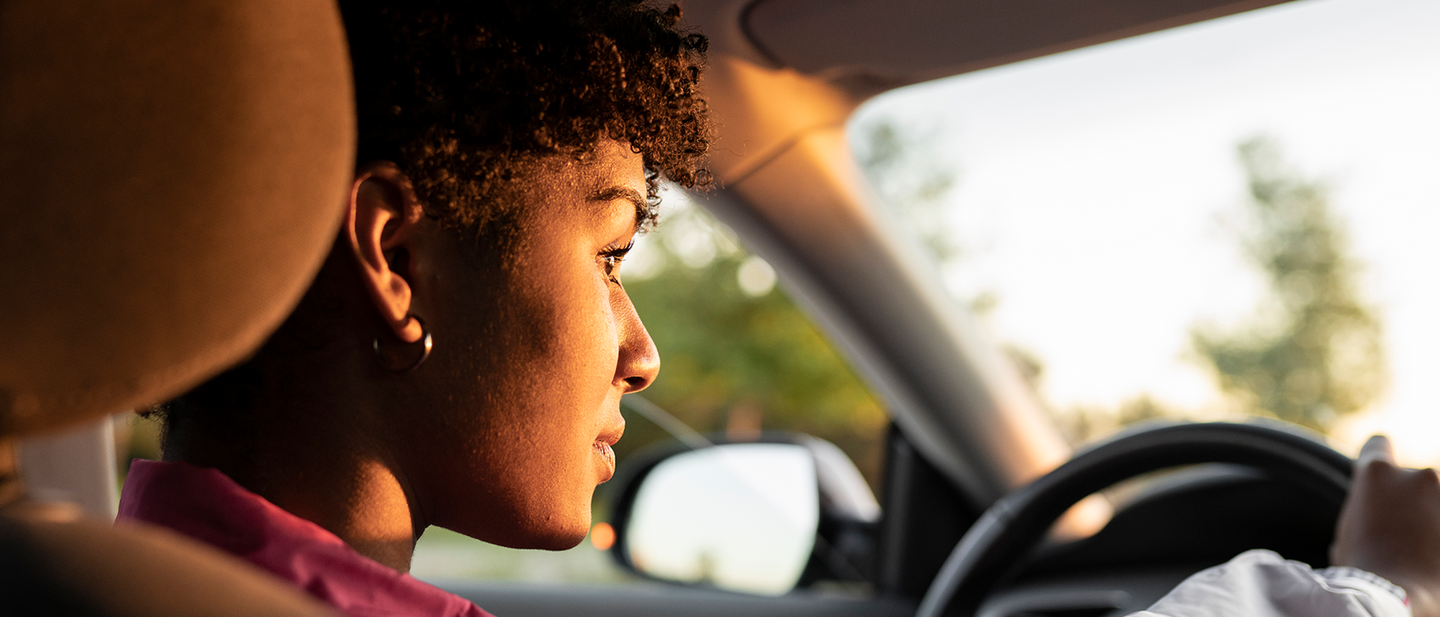 Picture of a woman driving a car